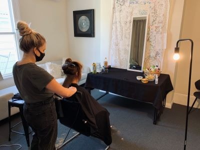 Woman getting a hair cut