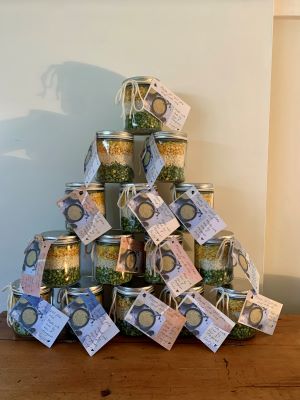 Mason jars displayed in a pyramid shape